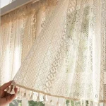 Rideau beige en macramé pour un style bohème chic