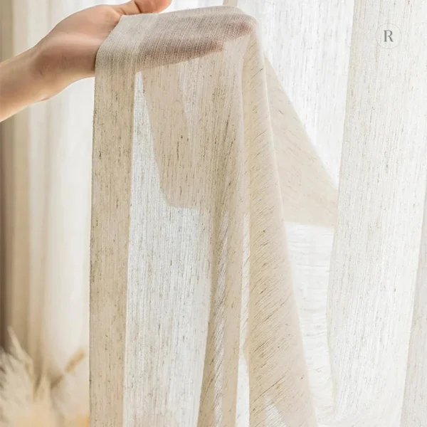 Voilage beige, accessoire décoratif essentiel