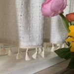 Rideau léger beige, idéal pour la luminosité