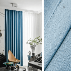 Rideau semi occultant bleu à motif décoratif