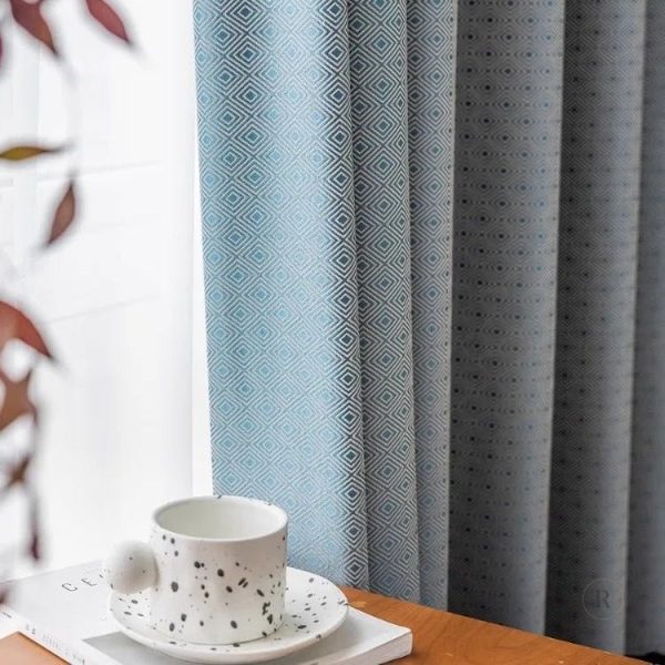 Rideau occultant en tissu bleu à motifs